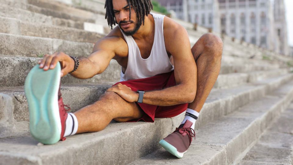 Man stretching leg