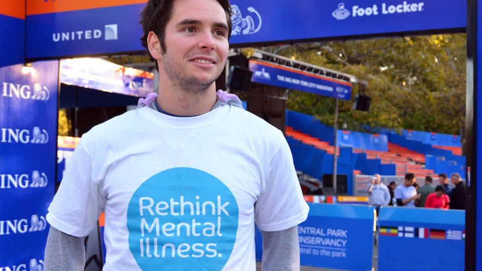 Kevin wearing a Rethink Mental Illness t-shirt