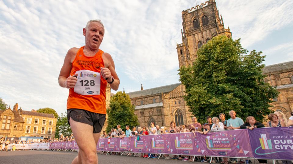 Runner heading towards the finish at the Durham City Run Festival