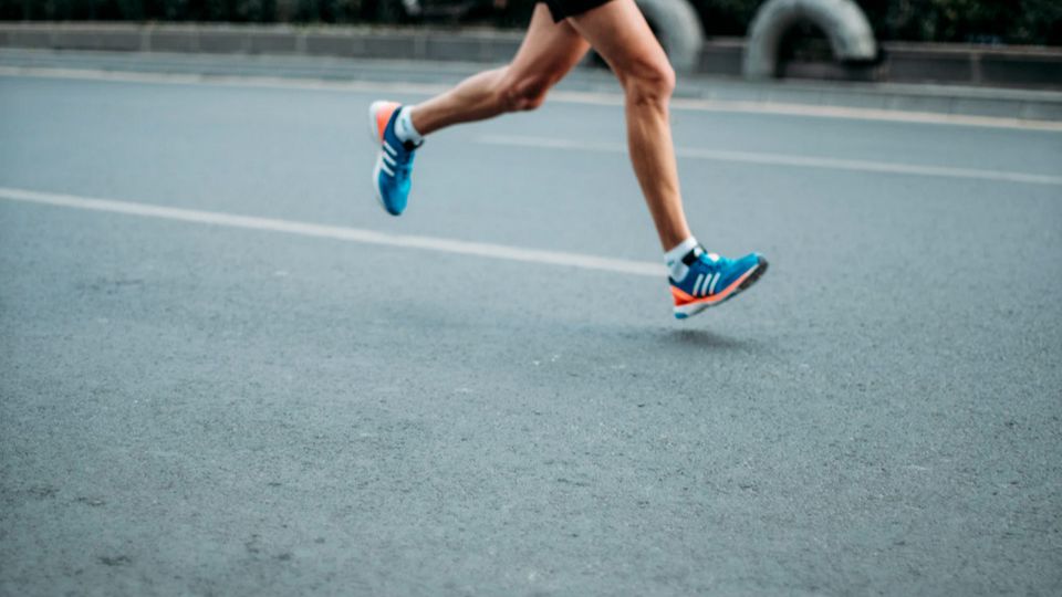 Lone runner leg shot