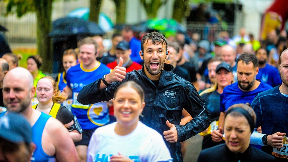 Soaked but happy runners