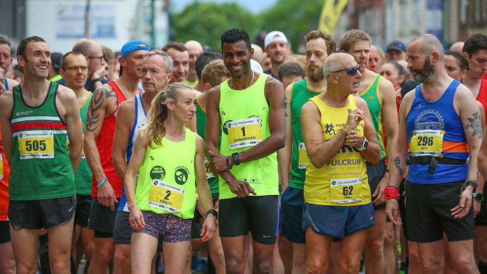 runners on the start line at Tour of Tameside