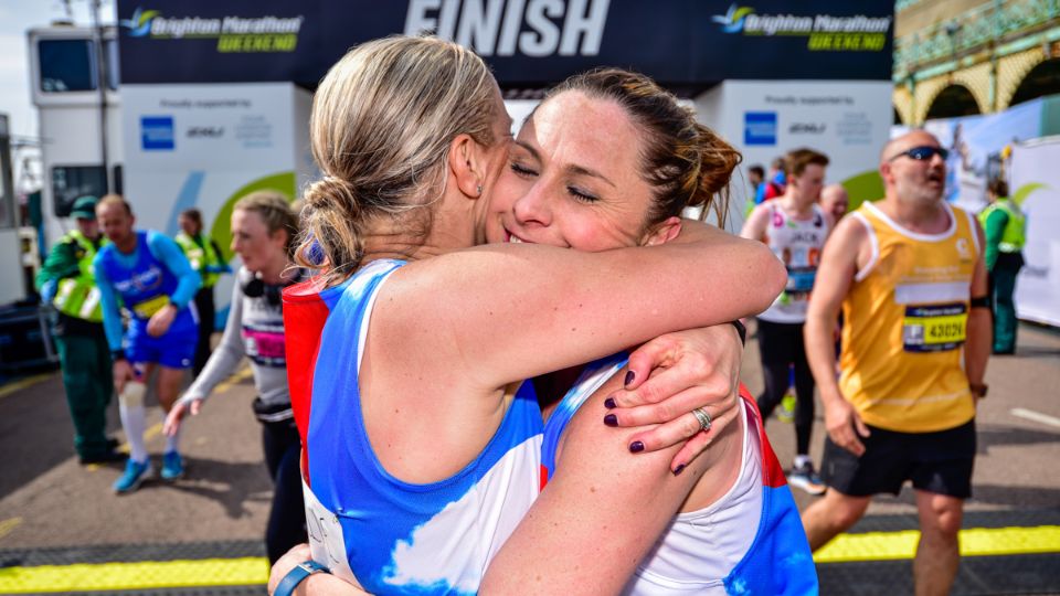 Brighton Marathon 2019 runners embrace