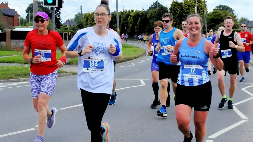 Smiling runners at the Cheadle 4