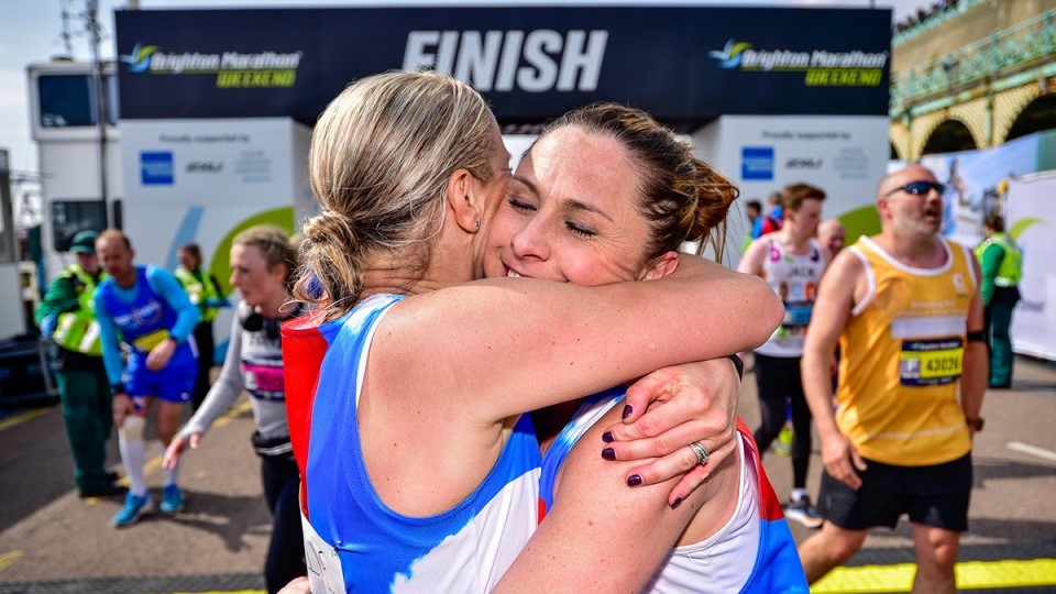 Brighton Marathon finish line embrace