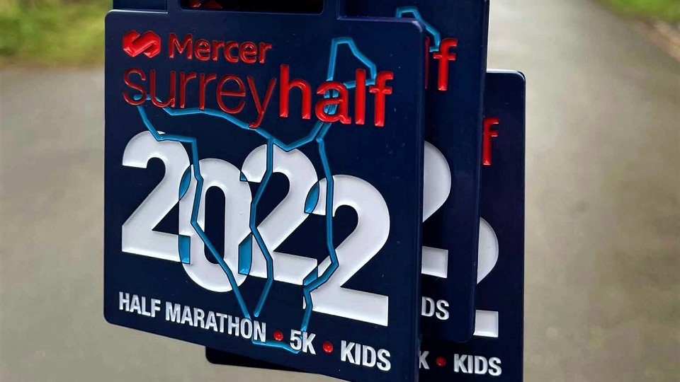 /images/2022/03/mercer-surrey-half-marathon-medals.jpg