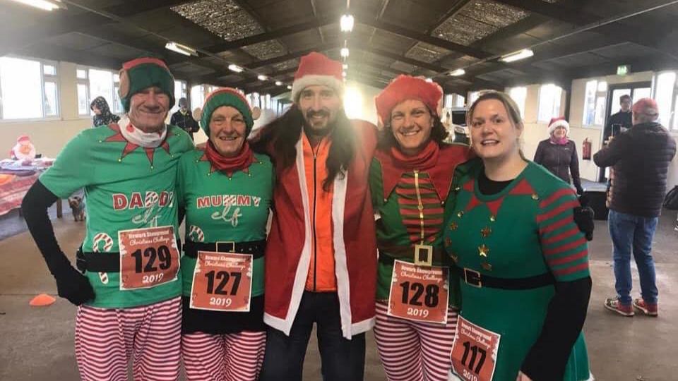 Adam Holland with fellow lap runners at the Newark Showground Christmas Challenge event