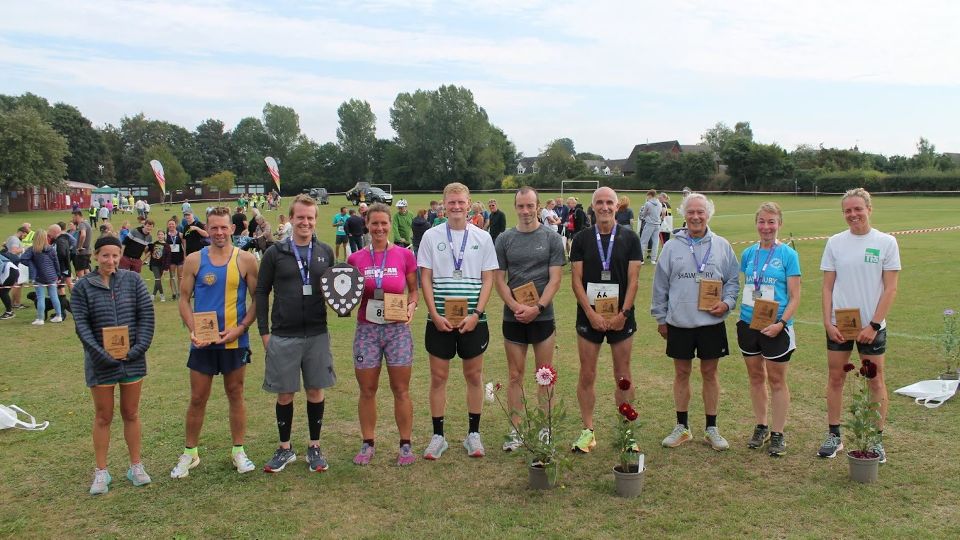 Proud winners with their prizes at the Tibberton Trot 10K
