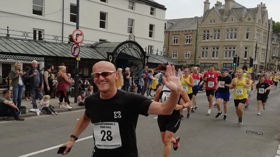 Smile and a wave at the Buxton Carnival 4