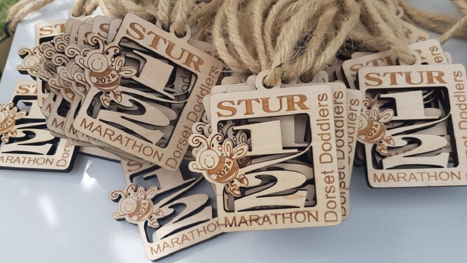 /images/2024/08/stur-half-medals-2024.jpg