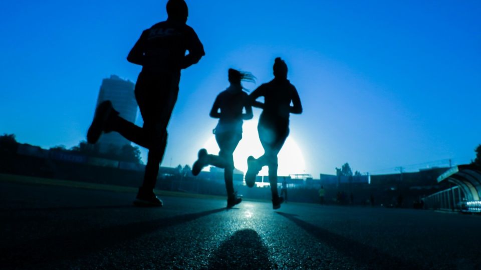 Female runners by Fitsum on Unsplash