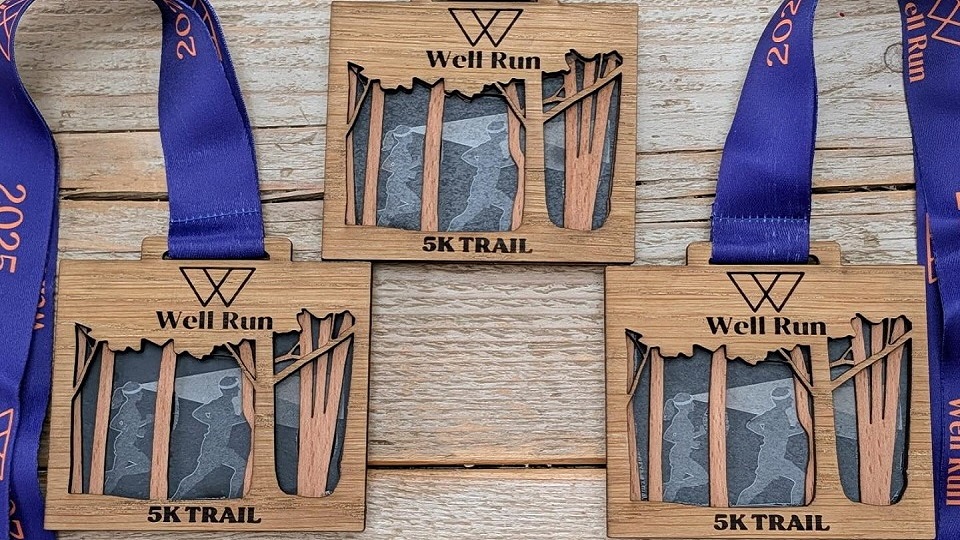 Well Run Night Trail medals