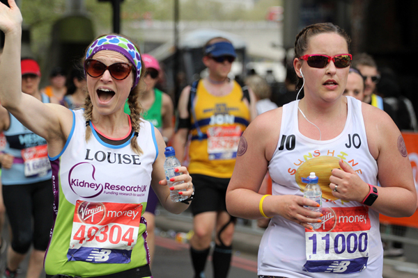 Two exuberant ladies in Kideney research vests at London Marathon