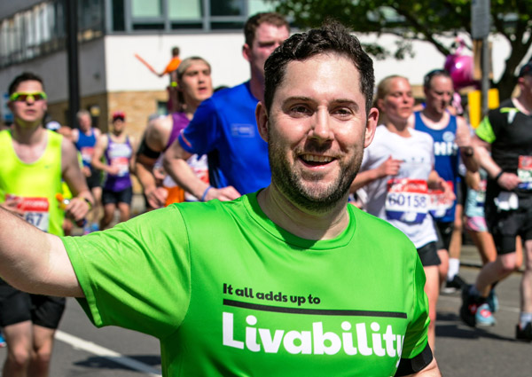 ruuner in Livability vest at Bournemouth