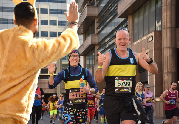 Runner gives High 5 at London Landmarks Half