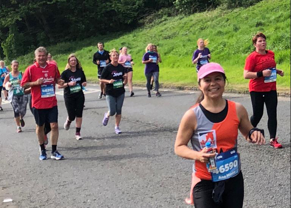 Happy runner in a Brooke running vest