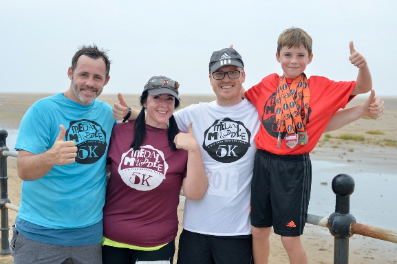 /images/enews/2019/3/medalmuddefinishers.jpg