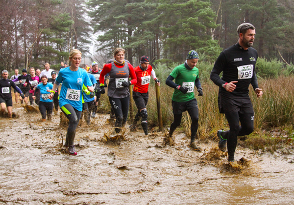 action from a very muddy Brutal Run