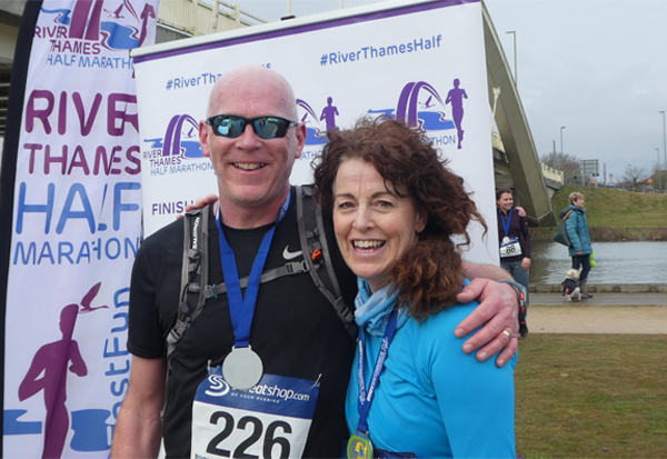 Two happy runners post-race at River Thames Half Marathon