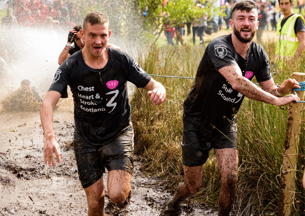 two runners plough through mud at The Beast
