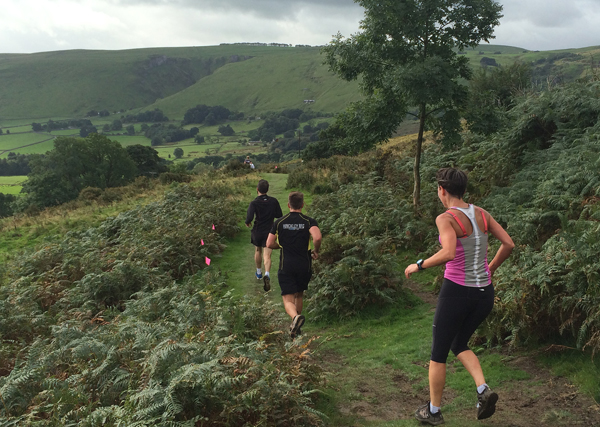 runners on a scenic trail route