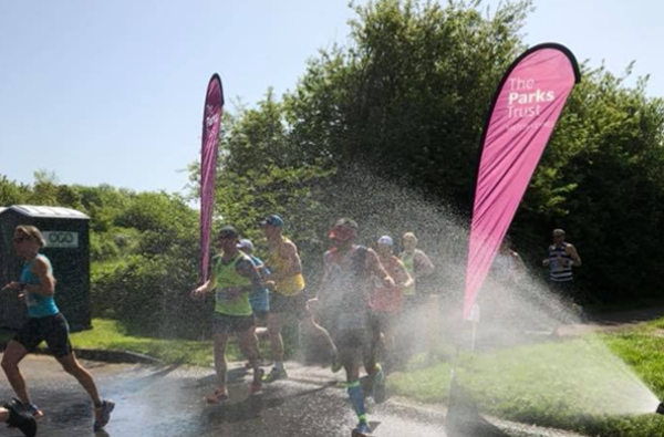 Runners Being Sprayed At The Milton Keynes Marathon