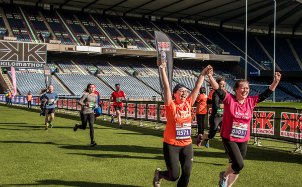Kilomathon runners enjoying a great Murrayfield Satdium finish