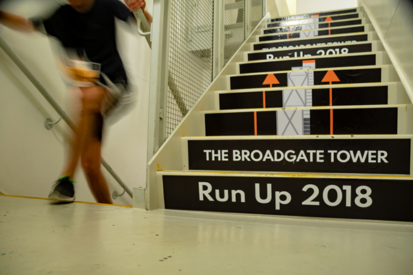 blurred shot of runner on stairs at Tower Run