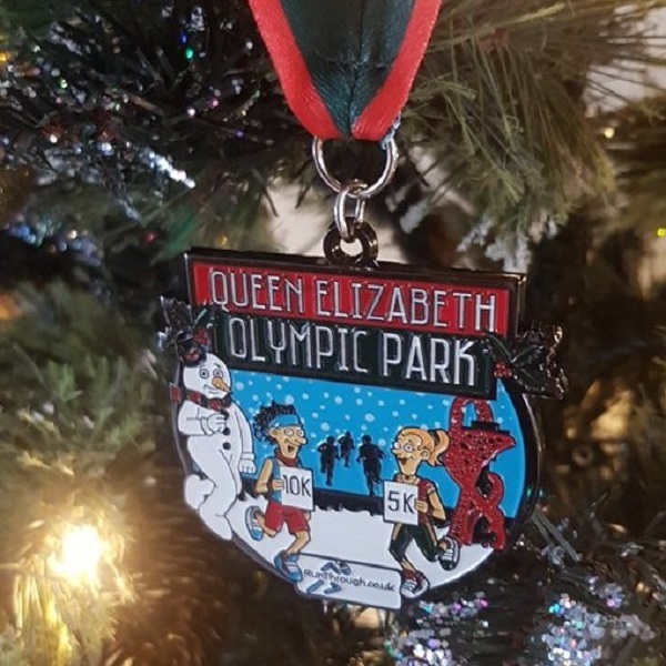 /images/news/2018/4/runthrough-qeop-christmas-medal.jpg