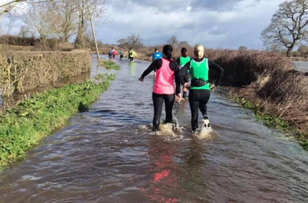 Runners Wade Through Water At Wrexham Festival Of Running
