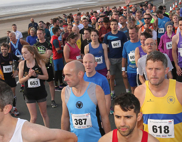 runners at Go Festival half marathon start