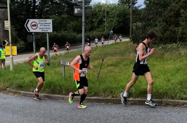 Runners At The Hilly Carl Rutt Memorial 10K
