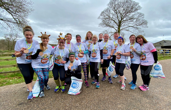 Runners Show Off Their Medals At New Knowsley 10K