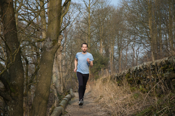 Runner On Forest Trails