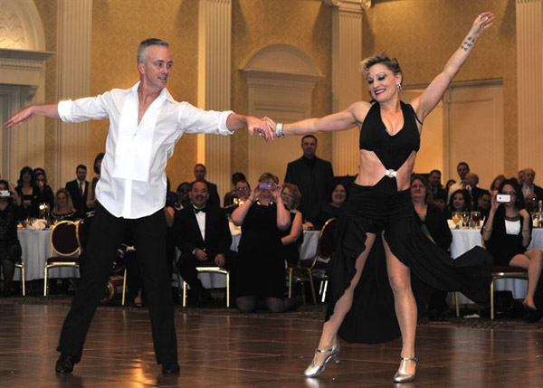 A couple ballroom dancing