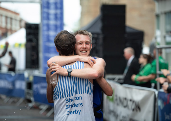 Runner hug at Derby Half