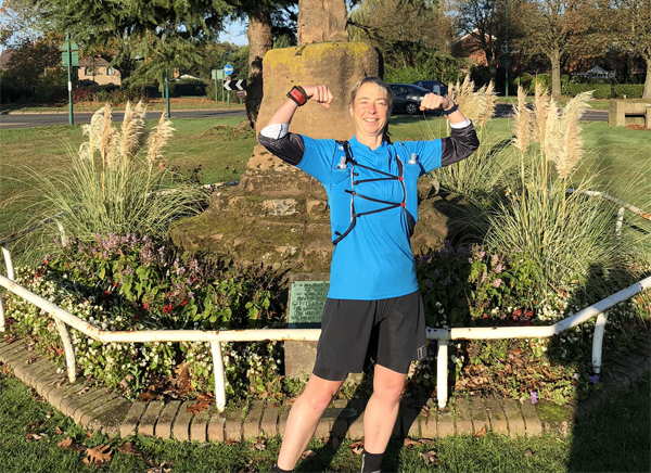 Jane Holt with raised arms