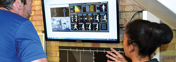 runner is shown movement analysed on screen
