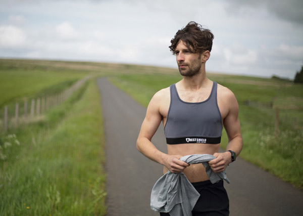 Man wearing the ChestShield crop top